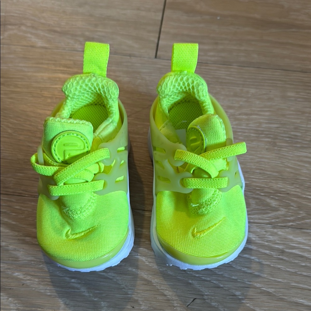 Nike Yellow Sneakers with Slip-On Design and Elastic Bands